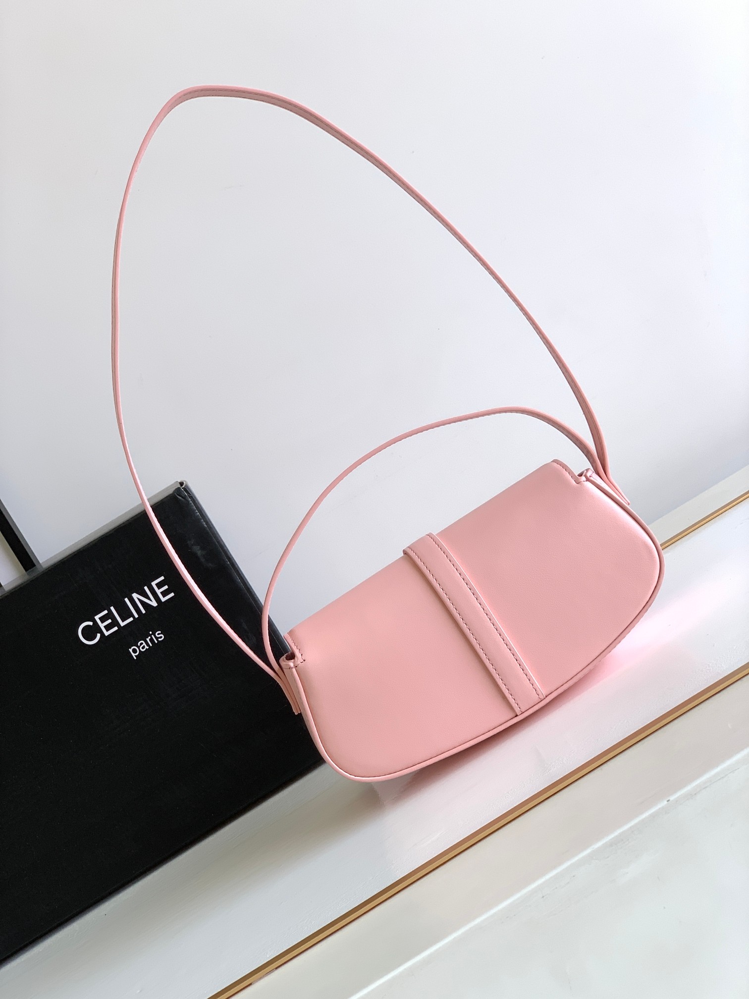 Ce**e mini tabou clutch on strap
