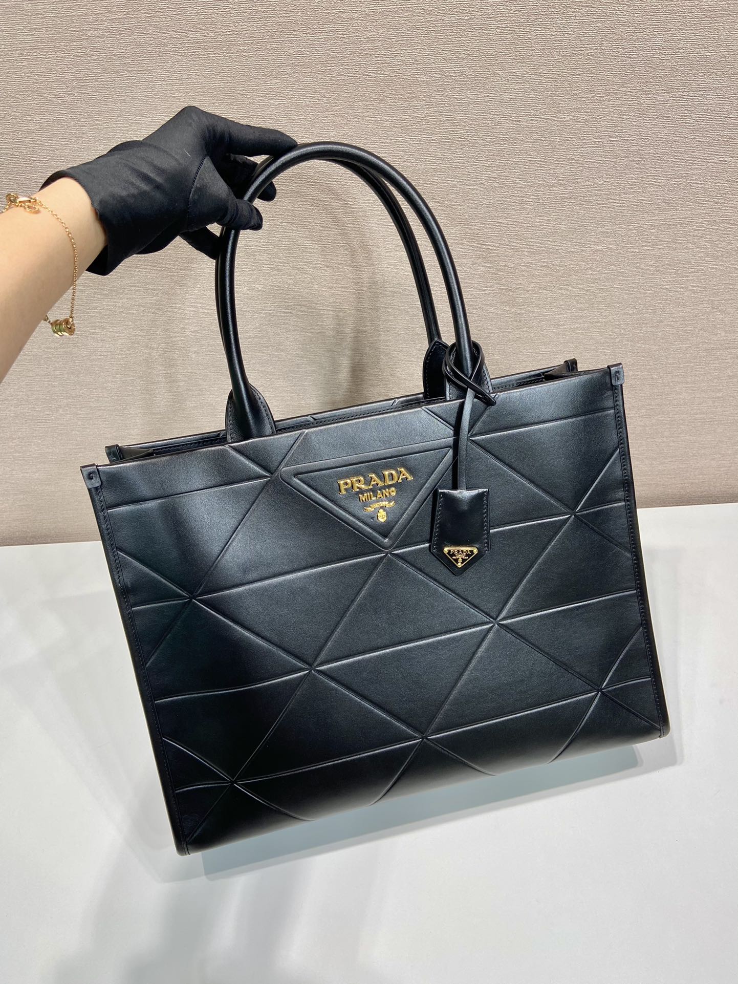 Pra*a large leather Pra*a symbole bag with topstitching