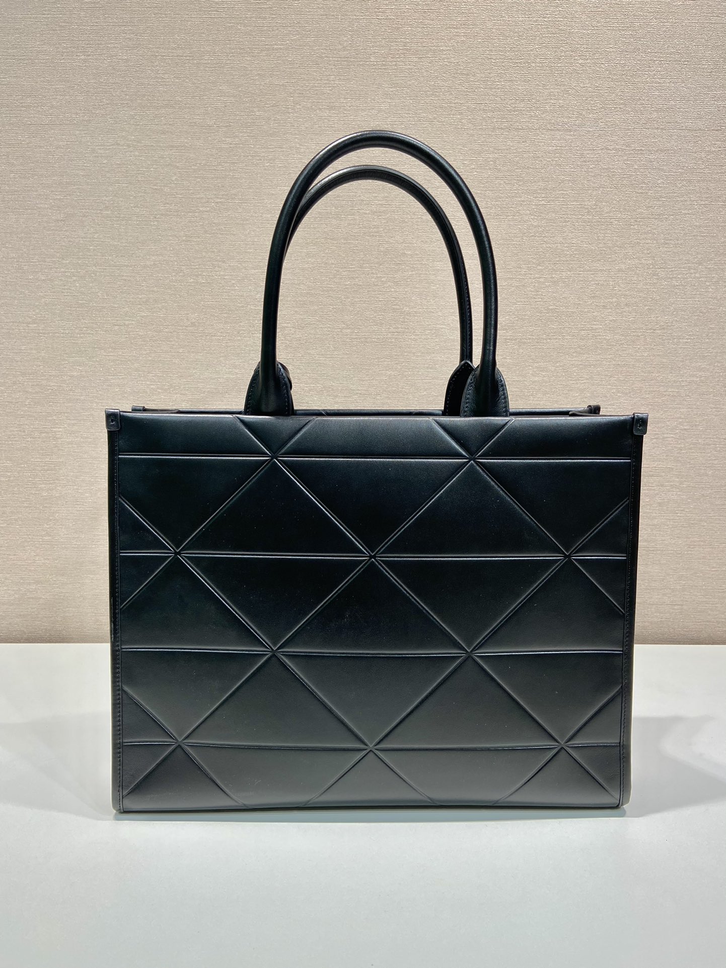Pra*a large leather Pra*a symbole bag with topstitching