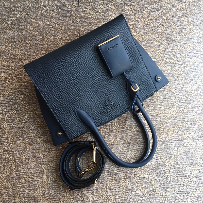 pra*a monoCh*0me small saffiano bag