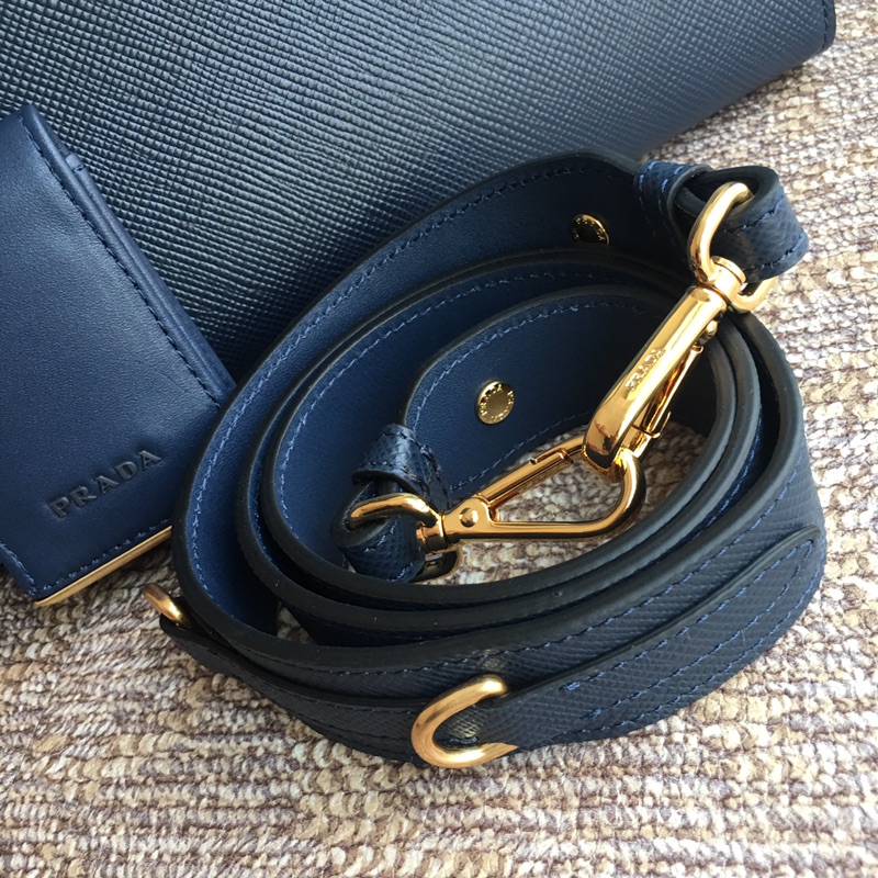 pra*a monoCh*0me small saffiano bag
