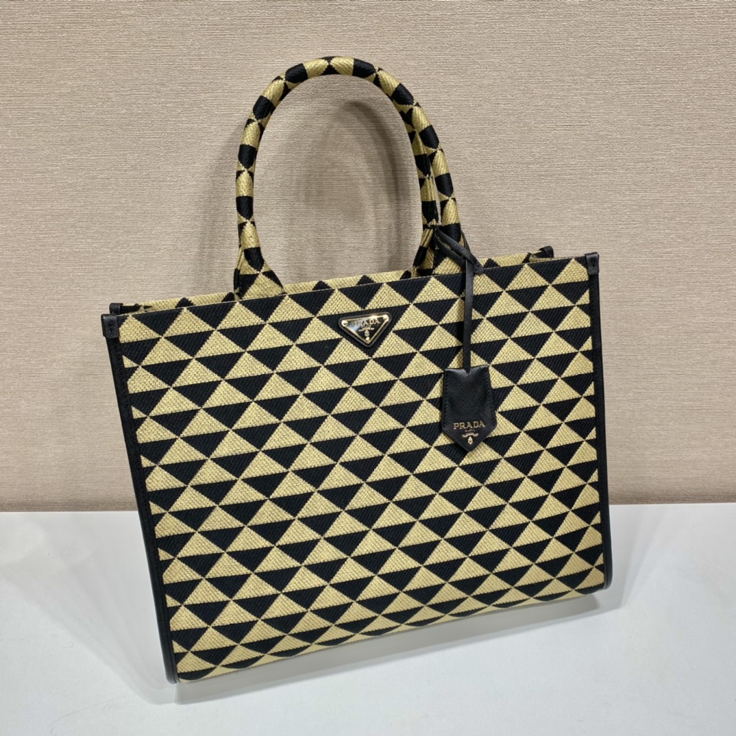large Pra*a symbole embroidered fabric handbag