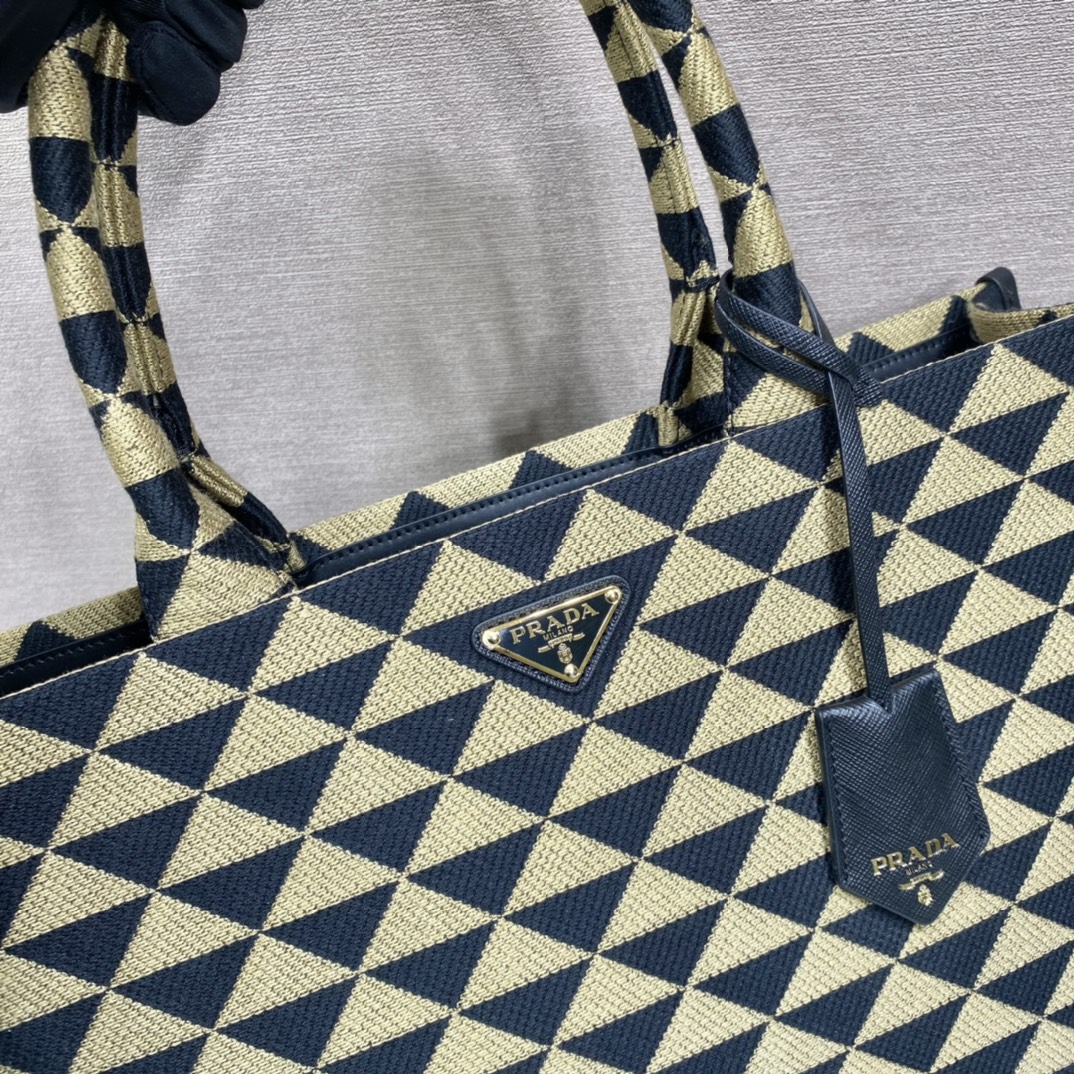 large Pra*a symbole embroidered fabric handbag