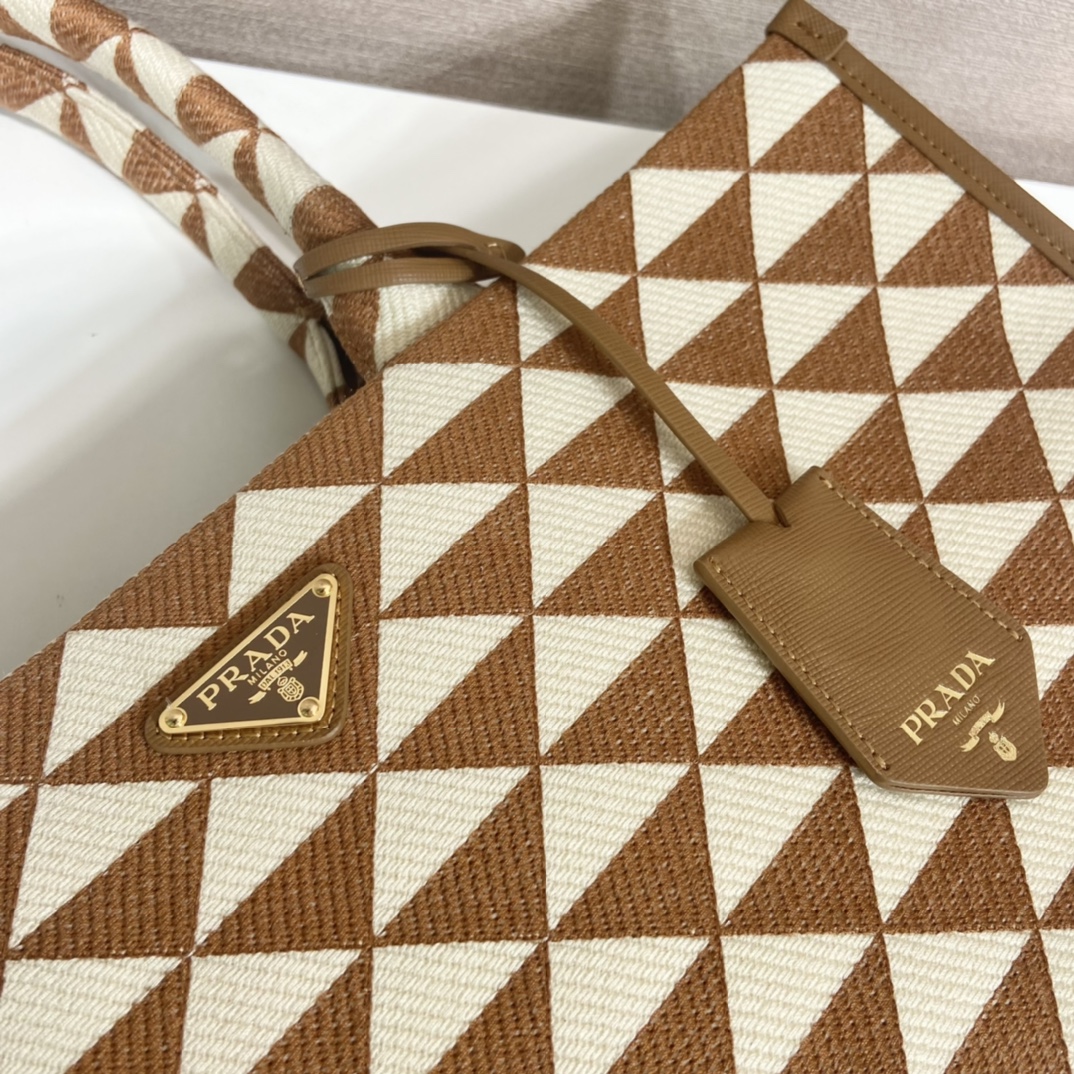 large Pra*a symbole embroidered fabric handbag