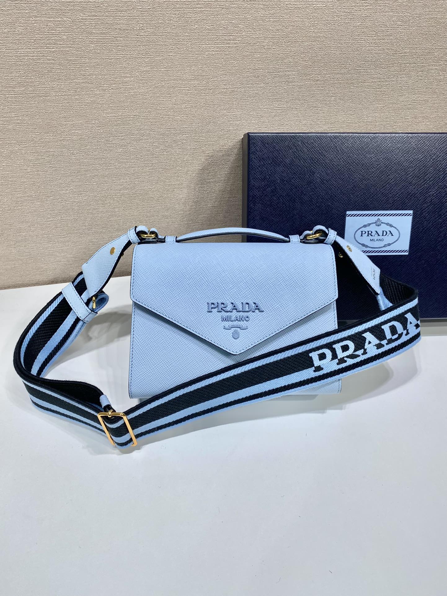 pra*a monoCh*0me saffiano and leather bag