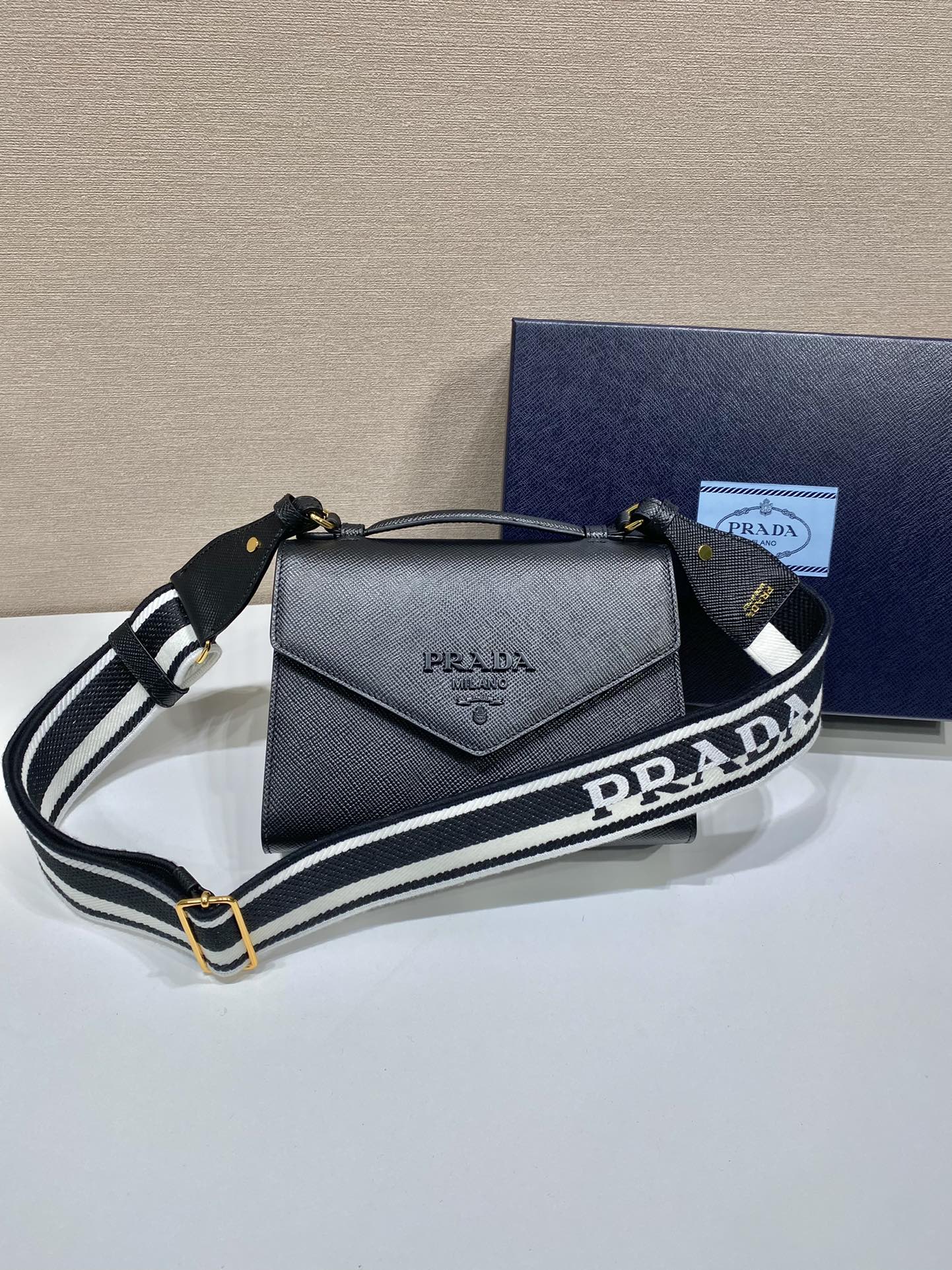 pra*a monoCh*0me saffiano and leather bag