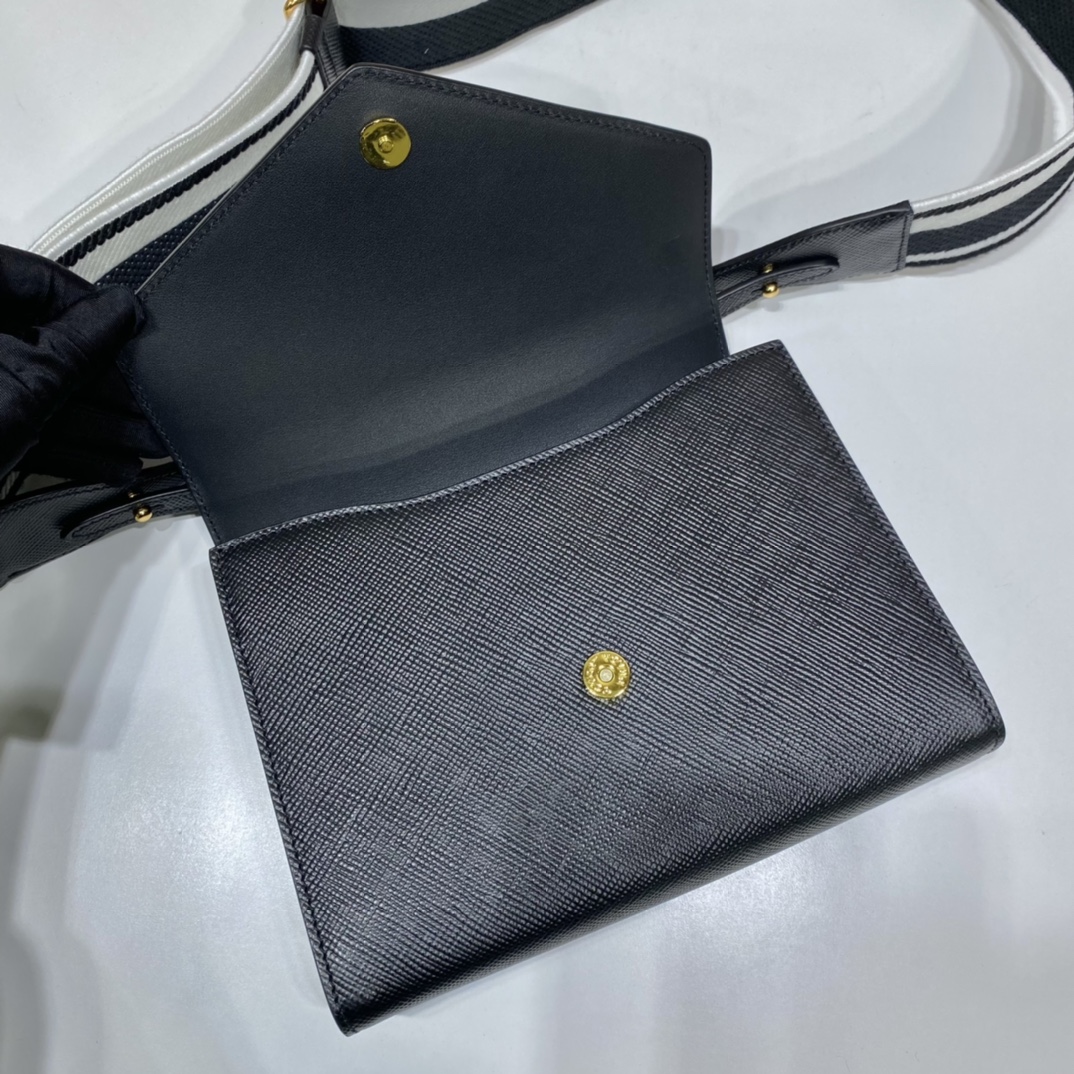 pra*a monoCh*0me saffiano and leather bag
