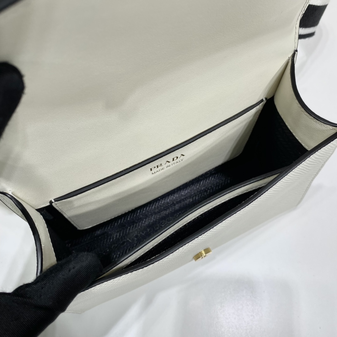 pra*a monoCh*0me saffiano and leather bag