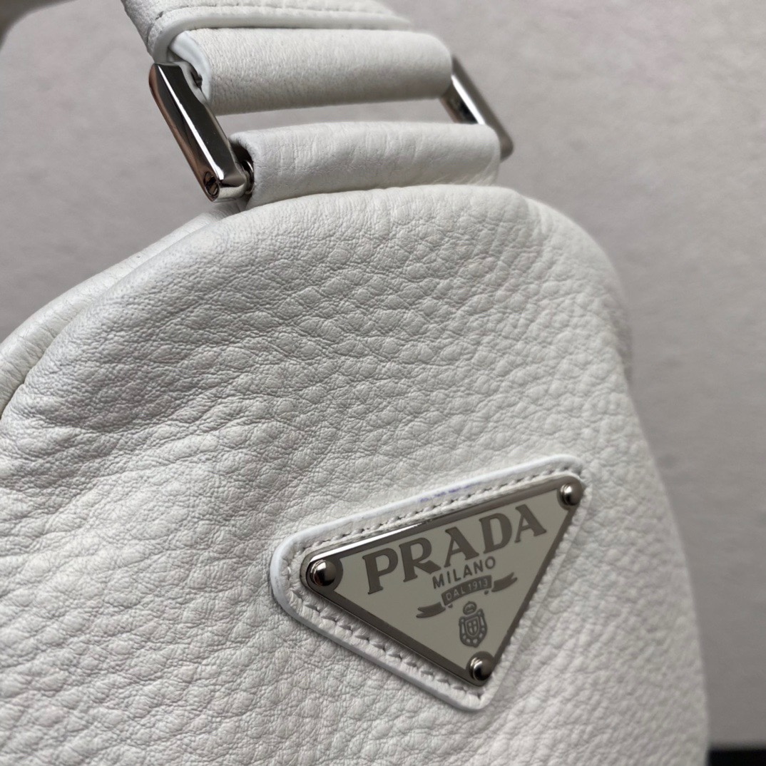 large leather Pra*a triangle bag