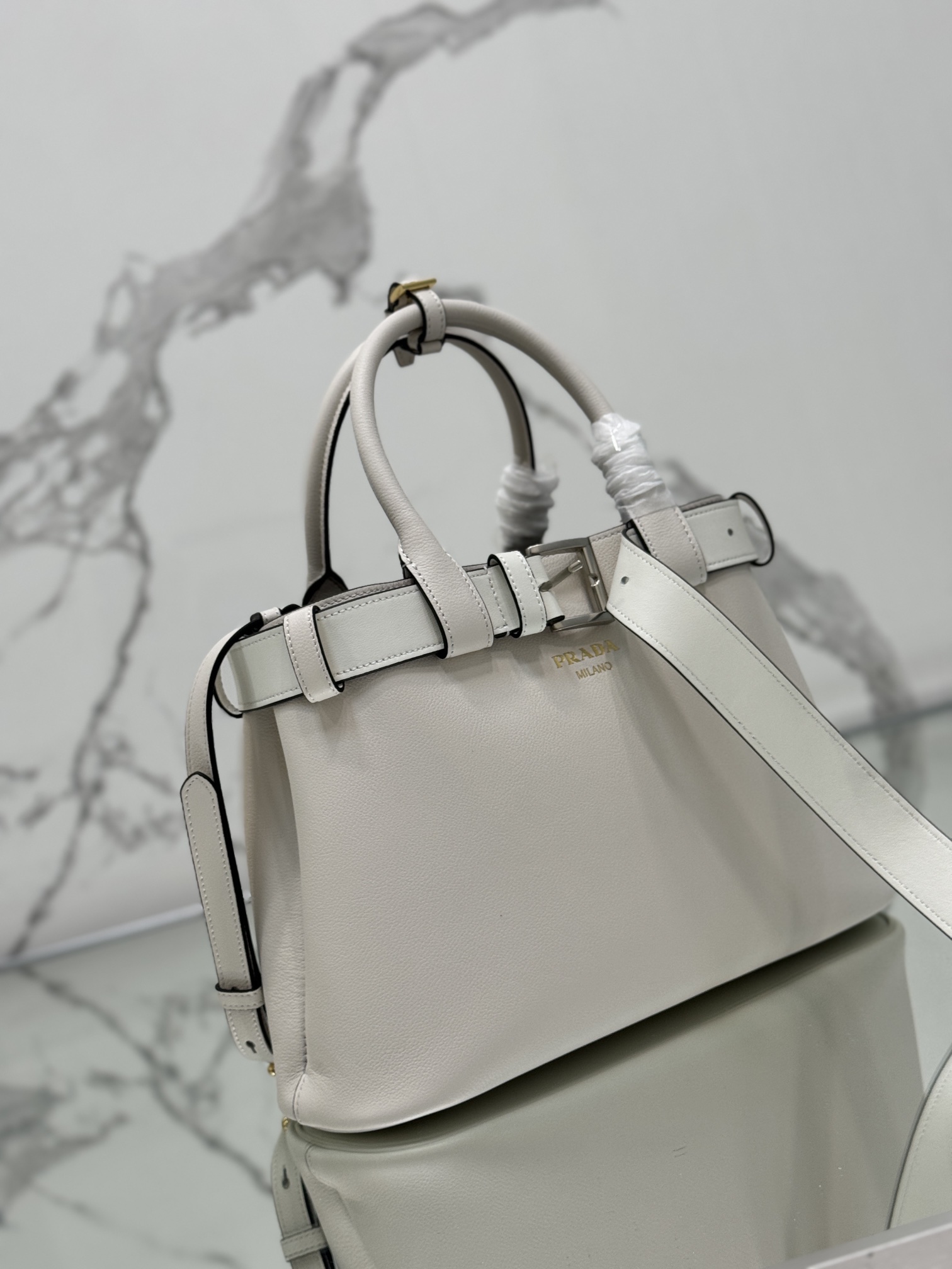 Pra*a buckle medium leather handbag with belt