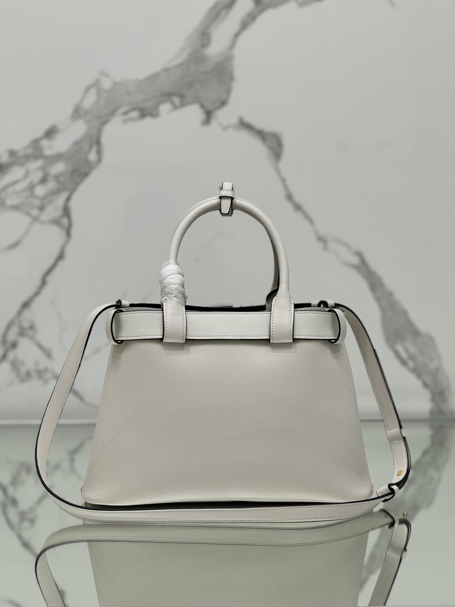 Pra*a buckle medium leather handbag with belt
