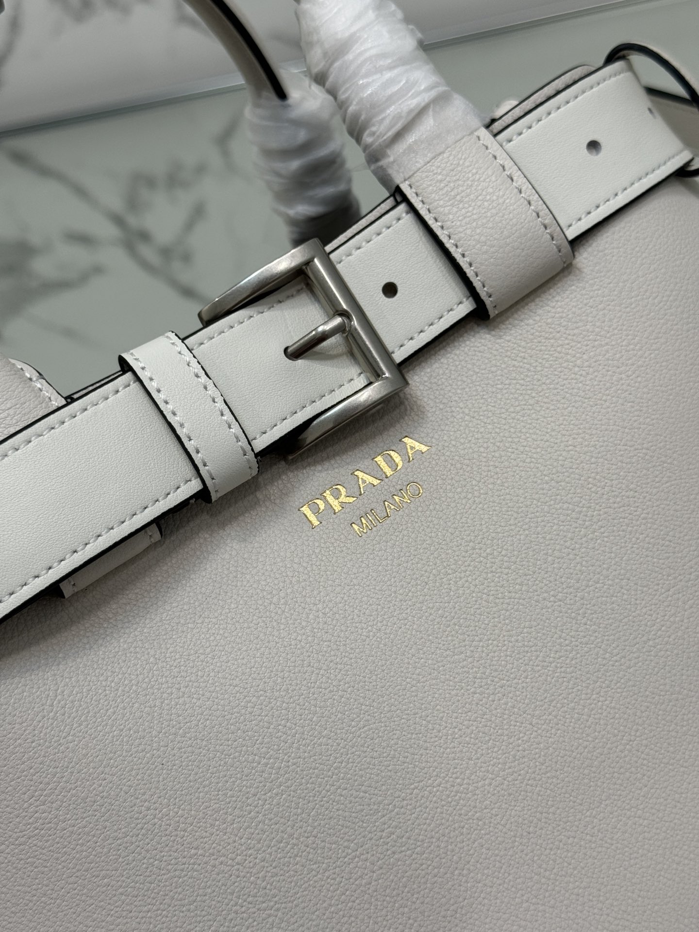 Pra*a buckle medium leather handbag with belt