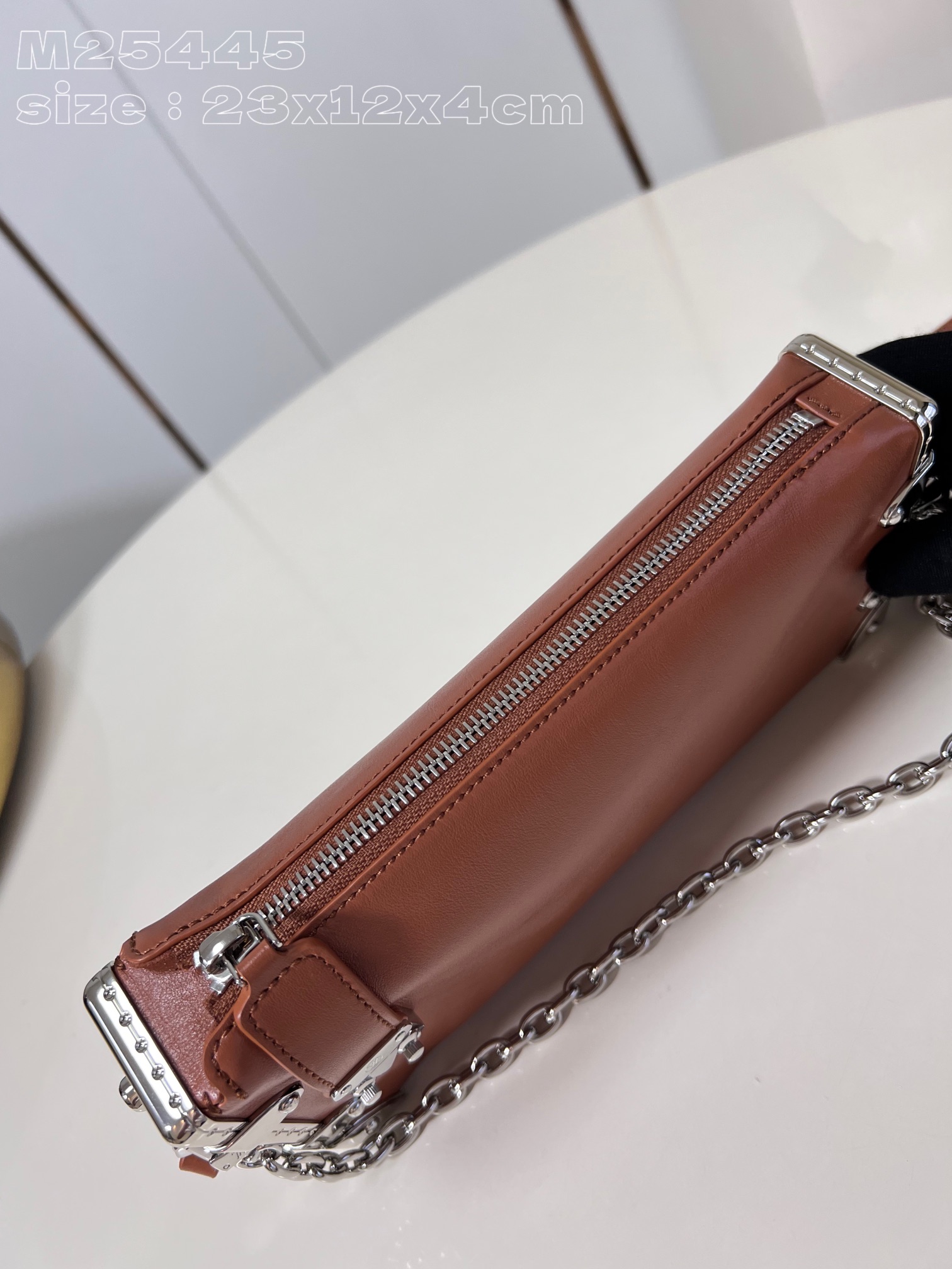 l**is V*t*n slim trunk handbag