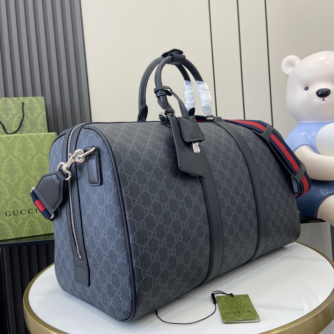 G*u*i gg duffle bag
